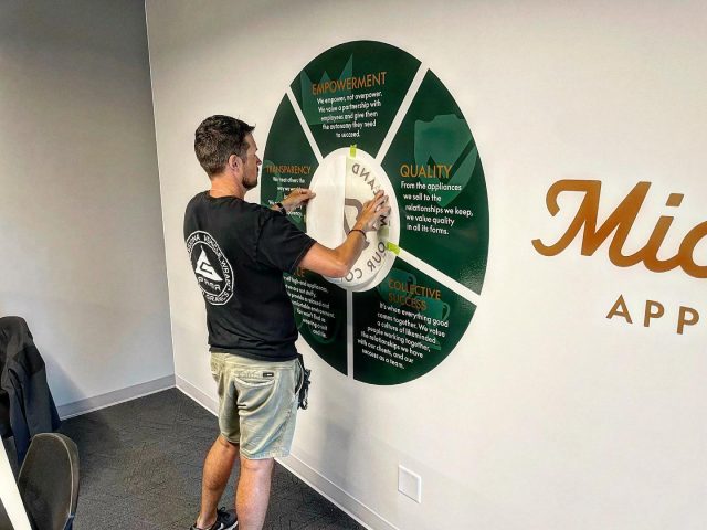 Wall graphics application from our talented owner @msmutylo! Thank you to @midlandappliance for teaming up with Prima. We had a blast working with your fleet and storefront graphics. Your business is appreciated 🙏  ****************************************************  #wallwrap #mural #wallgraphics #coppervinyl #graphics #design #midlandappliance #appliances